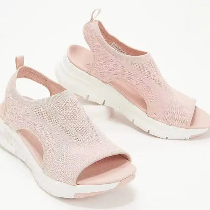 Sandalia VeranoFit Mujer rosa con diseño de cuña y punta abierta, ideal para el verano, con correa ajustable para comodidad.