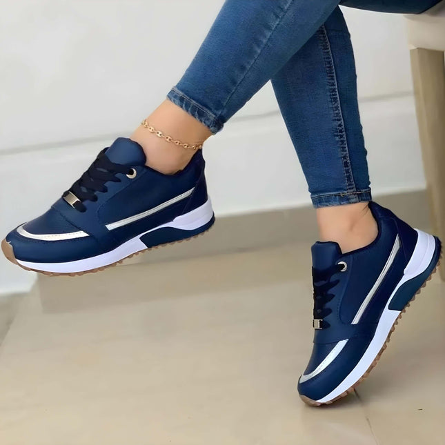 Zapatillas mujer FlexMove azul oscuro en promoción: compre 1 llevate 2. Estilo urbano y comodidad diaria con suela antideslizante.