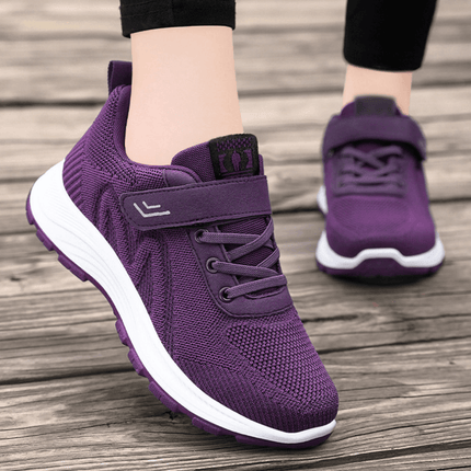Zapatillas ComfyRun en color púrpura con diseño transpirable y suela de alto rebote, ideales para ejercicio y estilo urbano.