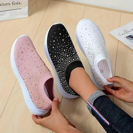 Three pairs of women's urban comfort glitter sneakers in pink, black, and white, designed for ergonomic support and style.