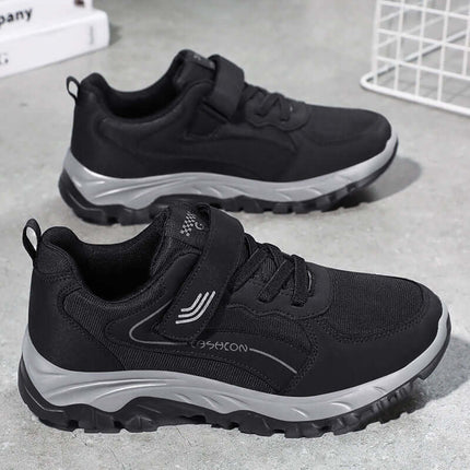 Zapatillas de mujer deportivas antideslizantes negras, cómodas y transpirables con diseño elegante de malla y punta anticolisión.