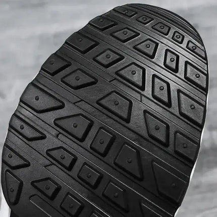 Suela de zapatillas deportivas hombre con diseño antideslizante, cómoda y moderna, ideales para caminatas y entrenamientos.
