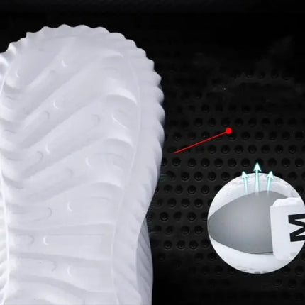Zapatillas deportivas hombre con suela antideslizante y transpirabilidad, ideales para correr. Ver detalle de diseño de amortiguación.