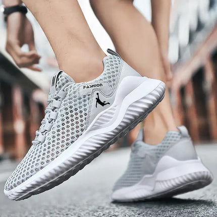 Zapatillas hombre para correr ligeras y transpirables, diseño moderno en color gris, zapatillas deportivas ideales para entrenamiento.