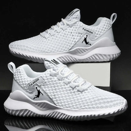 Zapatillas deportivas hombre, ligeras y transpirables, diseño moderno en blanco, perfectas para correr y entrenar.