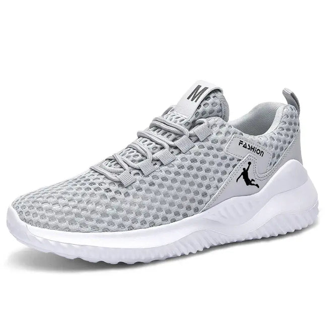 Zapatillas deportivas hombre grises, ligeras y transpirables para correr, estilo moderno para entrenamientos y actividades deportivas.