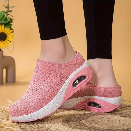 Zapatillas Luisa Mujer Ergonómicas en color rosa, diseño cómodo y moderno con suela anti impacto para soporte óptimo.