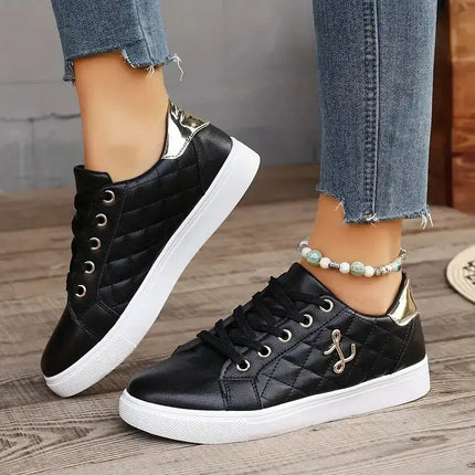 Black Zapatillas Mujer Lune with quilted design and metallic heel, offering urban elegance and comfort in synthetic leather.