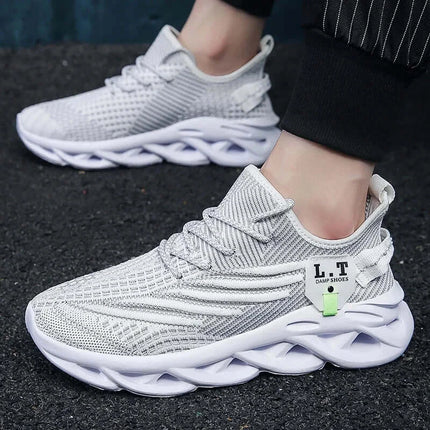 Zapatillas deportivas hombre ligeras y transpirables, perfectas para running, diseño moderno en color gris, ideal para entrenamientos.