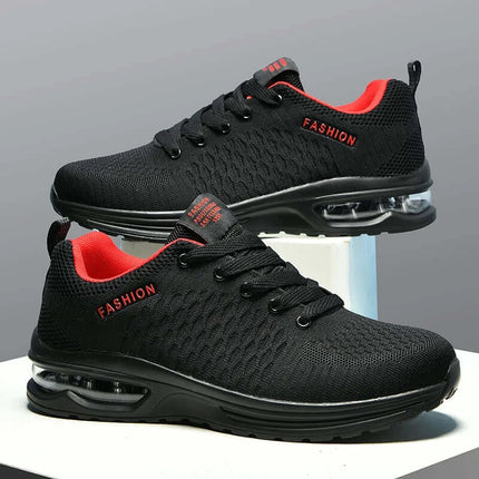 Zapatillas deportivas hombre negras y rojas, diseño liviano y resistente, ideales para running.