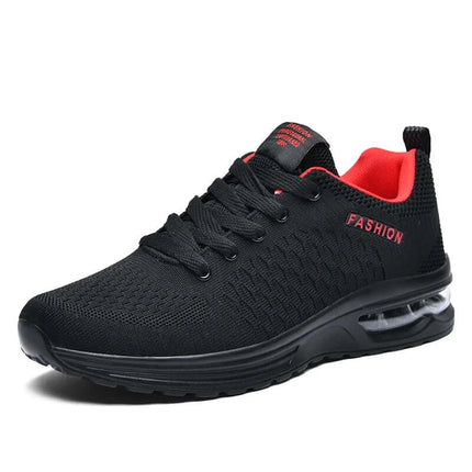 Zapatillas running hombre negras y rojas, resistentes y livianas, ideales para deporte.