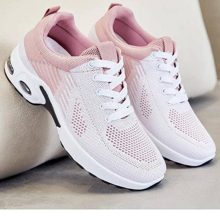 Zapatillas transpirables de verano para correr en color blanco y rosa con suela antiimpacto, perfectas para un calce cómodo y seguro.