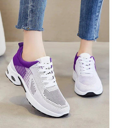 Zapatillas transpirables de verano con diseño ergonómico en color blanco y púrpura, ideales para correr y ofrecer soporte óptimo.