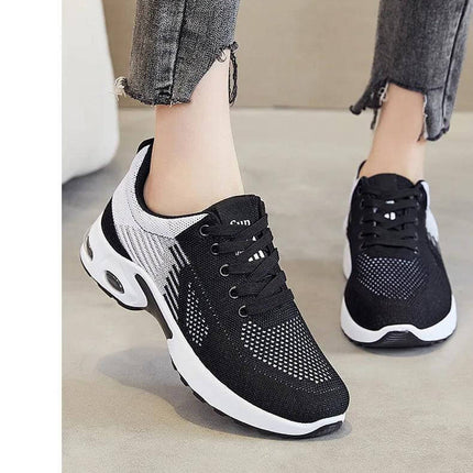 Zapatillas transpirables de verano para correr con suela antiimpacto y diseño ergonómico, color negro y blanco, ideal para comodidad diaria.