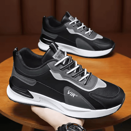 Zapatillas Urban Flow Hombre en negro y gris, combinando estilo y confort para el hombre moderno. Zapatillas deportivas hombre.