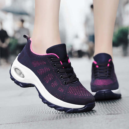 Zapatillas Urban Trek Zenithi in purple with pink accents, featuring Conforto Flex and Deep Care technology for comfort and style.