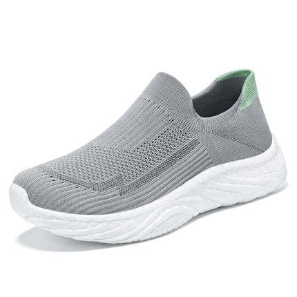 Zapato casual de mujer gris, transpirable y ligero, con diseño elegante y parte superior tejida para mayor comodidad y versatilidad.