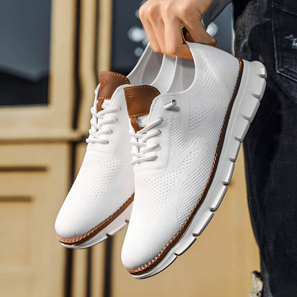 Zapatillas casuales de hombre blancas con detalles en cuero, elegantes y cómodas para el uso diario. Zapatos casuales hombre.