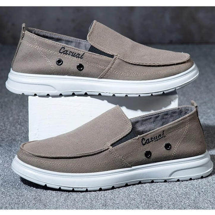 Zapatos de lona casuales para hombre con suela blanca y diseño cómodo para caminar.