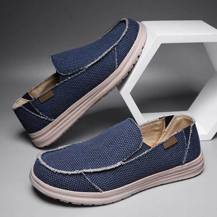 Zapatos informales transpirables de lona azul marino para hombre, estilo casual ideal para uso diario, con suela cómoda.