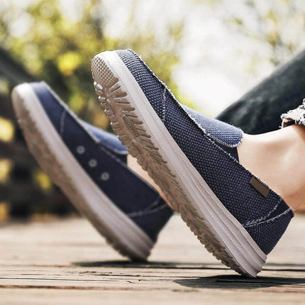 Zapatos casuales de lona para hombre, diseño transpirable, ideales para uso diario al aire libre.