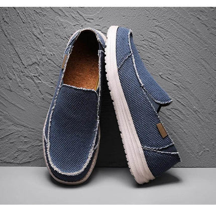 Zapatos casuales hombre, transpirables de lona azul, ideales para uso diario.